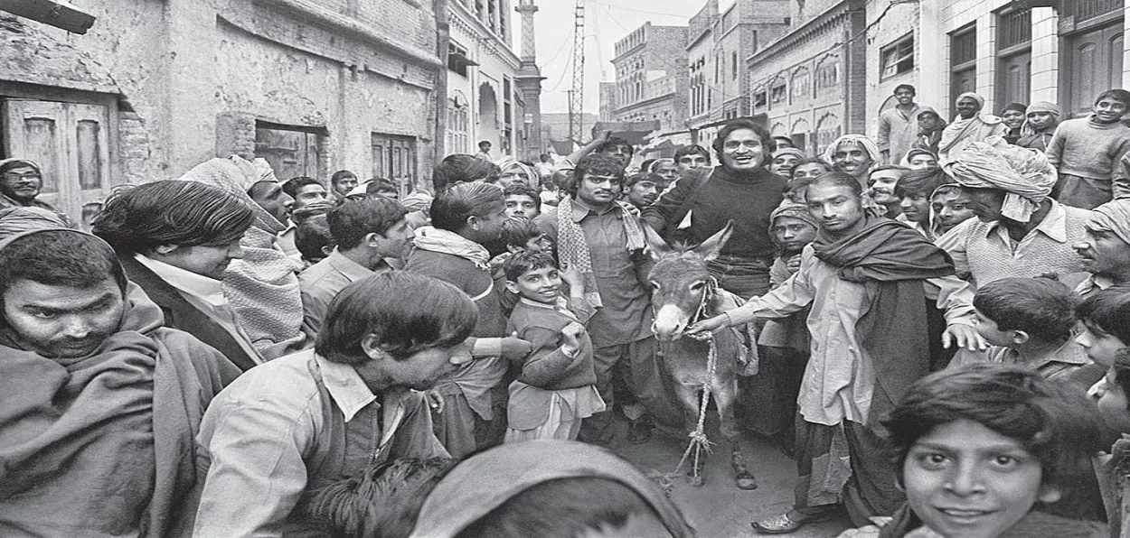 Raghu Rai riding a doney in Pakistan as a mark of respet shown by locals (Picture by author)